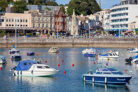 TORQUAY, DEVON, UK - JULY 28 : View of the Town and Harbour in Torquay Devon on July 28, 2012. Unidentified peopleのeditorial素材
