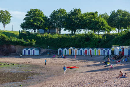 BROADSANDS, DEVON, UK - JULY 28 : Beach huts in Broadsands. Devon on July 28, 2012. Unidentified peopleのeditorial素材