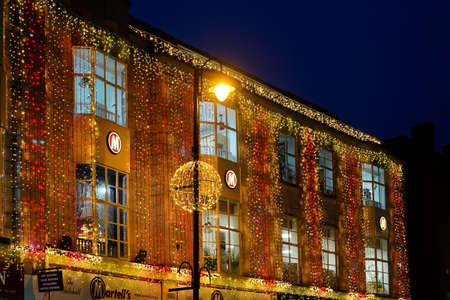 EAST GRINSTEAD,  WEST SUSSEX, UK - DECEMBER 16 :  Christmas decorations and lights in East Grinstead, West Sussex on December 16, 2021のeditorial素材