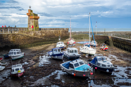 LYNMOUTH, DEVON, UK - OCTOBER 19 : View of the harbour at low tide in Lynmouth, Devon on October 19, 2013. Unidentified peopleのeditorial素材