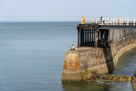 WHITBY,  NORTH YORKSHIRE, UK - JULY 19: Fishing at the harbour entrance in Whitby, North Yorkshire...