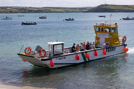 Rock, Cornwall, UK - June 12. View of the ferry at Rock, Cornwall on June 12, 2023. Unidentified peopleのeditorial素材