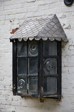 Alford, Lincolnshire, UK,  September 21. View of an old derelict window at Claythorpe Watermill in Alford, Lincolnshire on September 21, 2023のeditorial素材