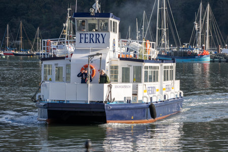 Dartmouth, Devon, UK - January 14. Passenger ferry crossing the River Dart in Dartmouth, Devon on...