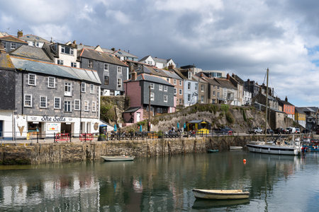 MEVAGISSEY, CORNWALL, UK, MAY 3. View of Mevagissey harbour in Cornwall on May 3, 2024. Unidentified peopleのeditorial素材