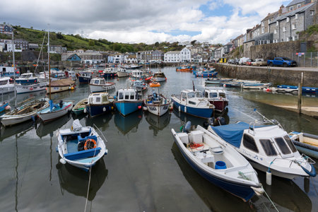 MEVAGISSEY, CORNWALL, UK, MAY 3. View of Mevagissey harbour in Cornwall on May 3, 2024