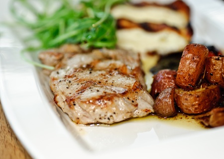 Grilled meat with vegetablesの写真素材