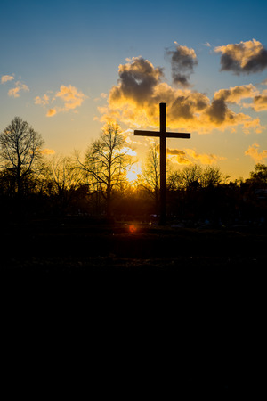 Christian cross in the sunsetの写真素材