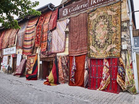 Goreme, Turkey - October 2019. Traditional turkey carpets at the town street store