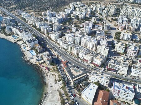 Aerial view of mediterranean town by the sea.の写真素材