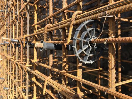 Metal reinforcement of concrete wall with plastic holders.の写真素材
