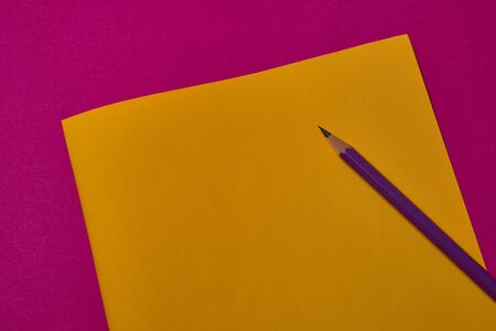 crayon at yellow and magenta background with copy space.の写真素材