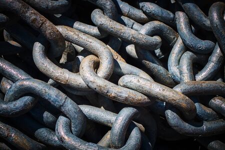 Rolled metal chain background or pattern concept.の写真素材