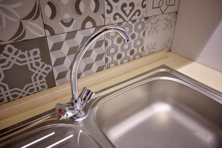 Brand new sink and chrome water faucet.