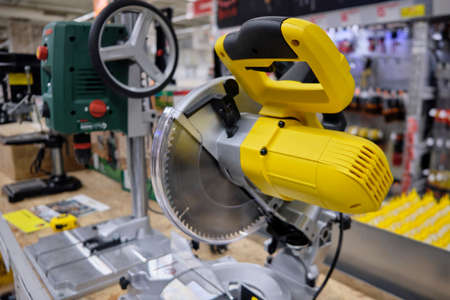 Cross cut saw machine electric tools close up.の写真素材