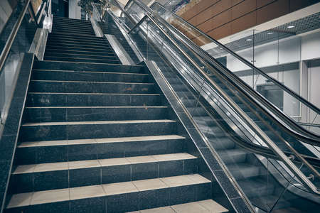 Empty staircase and escalators at the airport.