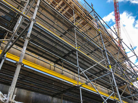 Scaffoldings at construction site. Auxillary construction equipment. High quality photoの写真素材