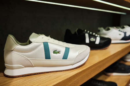 Lacoste Partner Retro sneakers at shelf of store. Mersin, Turkey - November 2020