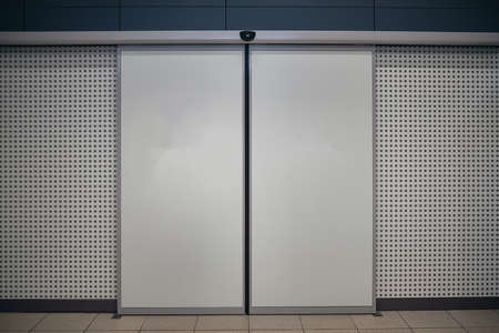 Blank automatic entrance doors with motion sensor at public placeの写真素材