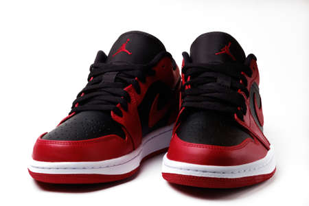 Nike Air Jordan 1 Retro Low Reverse Bred colorway sneakers isolated on whiteのeditorial素材