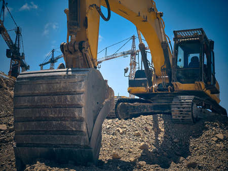Low angle view of excavator at construction site