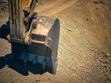 Bucket of excavator on construction siteの写真素材