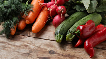Ripe vegetables on a wooden table