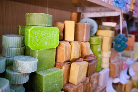 Craft multi-colored natural organic soap bars at shop shelf