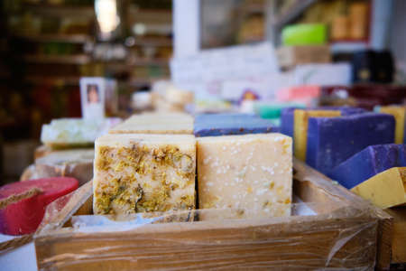 Craft multi-colored natural organic soap bars at shop shelf