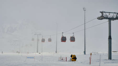 Gondola type ropeway on the slope of ski resortの写真素材