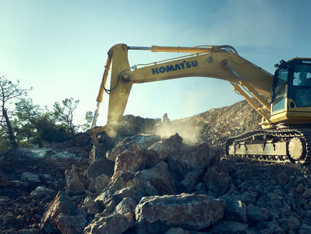 Komatsu excavator at road construction worksのeditorial素材