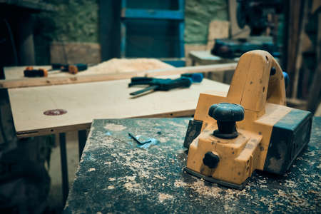 Carpenter plane at workbench