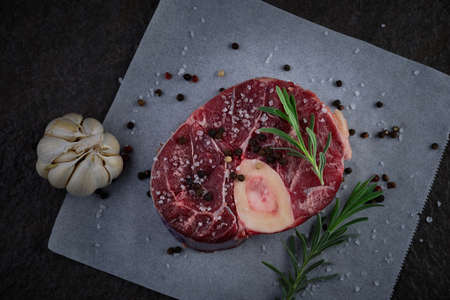 Raw osso buco on baking paperの写真素材