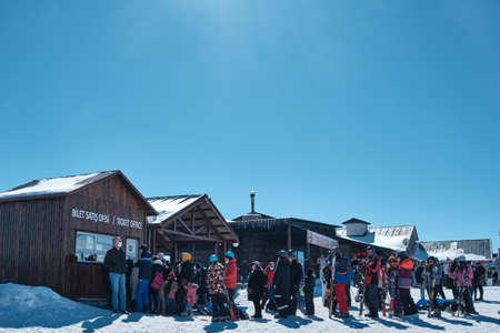 Queue to ticket sales office at ski resort