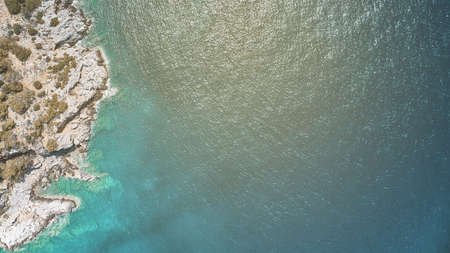 Aerial view of rocky sea coastの写真素材