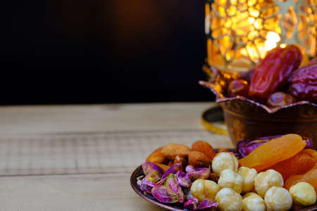 Dried fruits lighten by arabic lanternの写真素材