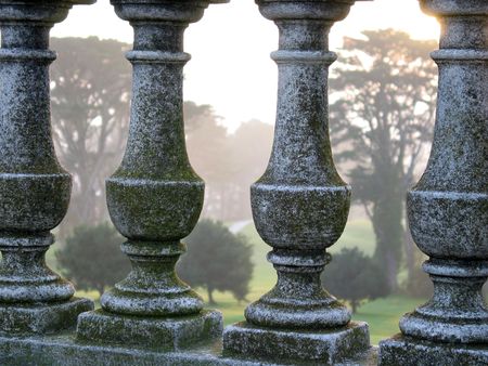 Light through stone fence.の写真素材
