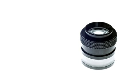 A loupe, alone on a light table, with room to the left for copy, etc.の写真素材