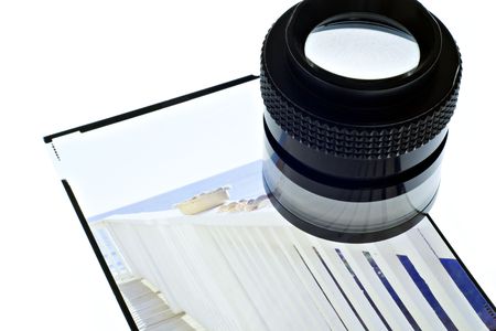 Loupe on a 4x5 transparency on a light table.の写真素材