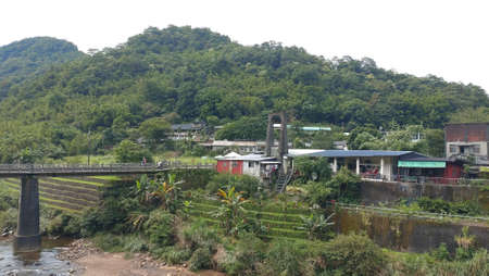 The view of the rail bridge across the river.