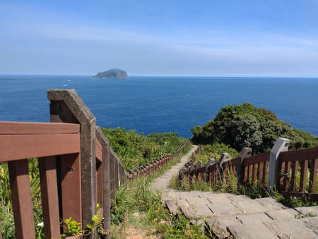 The view of the trail on the mountain with blue sky