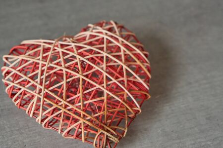 braided heart, valentine on tableの写真素材