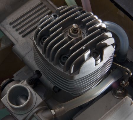 Close up of model aircraft glo engine cylinder head