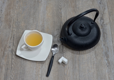 cup of tea with a teapot blackの写真素材