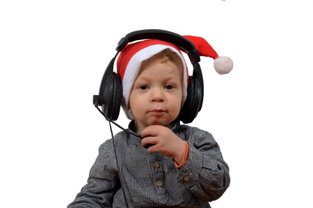 baby christmas with headphones isoledの写真素材
