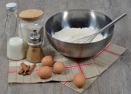 preparing pancakes with sugar on a wooden tableの写真素材