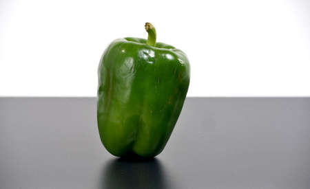 green pepper isolated on a white の写真素材