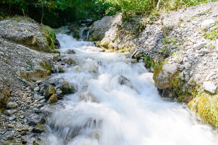 a small waterfall in the French Alpsの写真素材