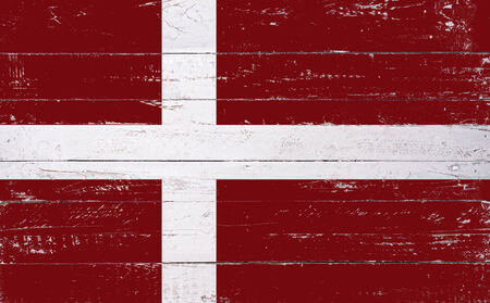 Danish flag painted on a wooden boardの写真素材