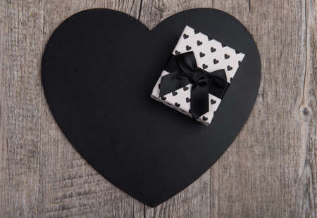 black heart with a gift for valentine dayの写真素材